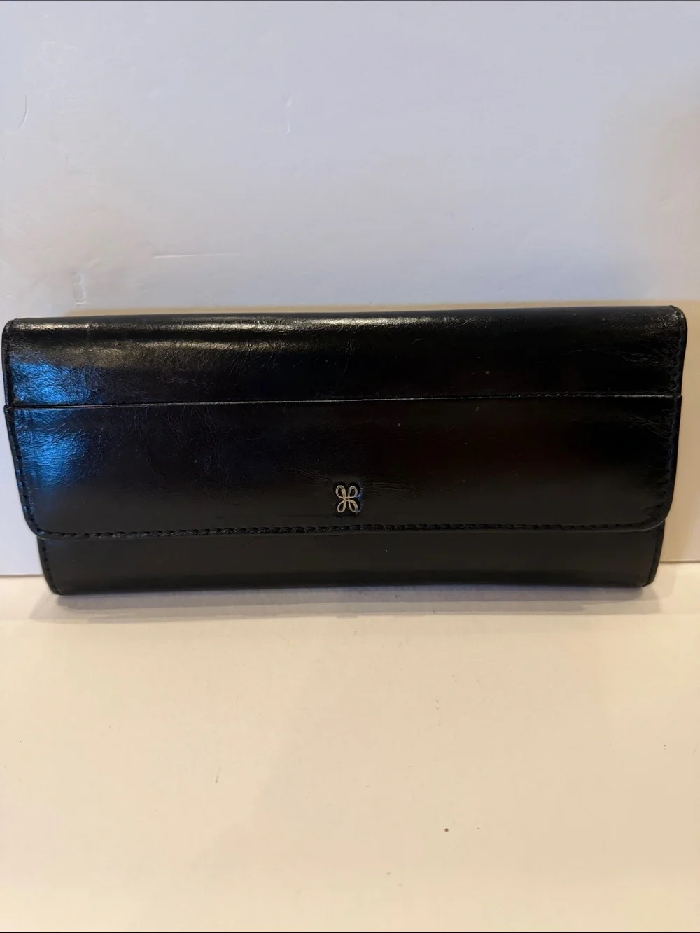 HOBO Black Leather Long Flap Wallet with Logo Accent